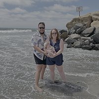 Alex, Jody and Mila on her first trip to the beach!